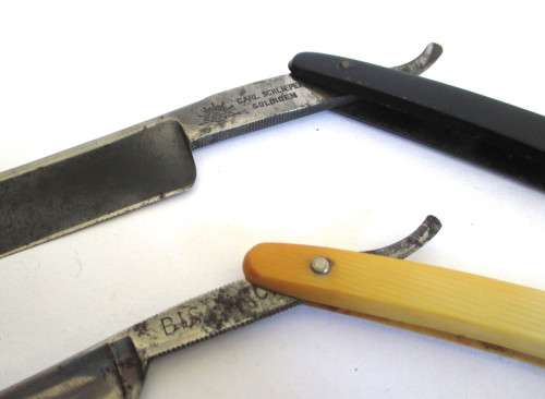 TWO ANTIQUE STRAIGHT CUT THROAT RAZORS. SOLINGEN - CARL SCHLIEPER AND BISMARCK.