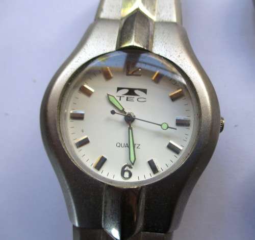 Lot of Five Watches. Not working. Good for Parts or just needs battery.