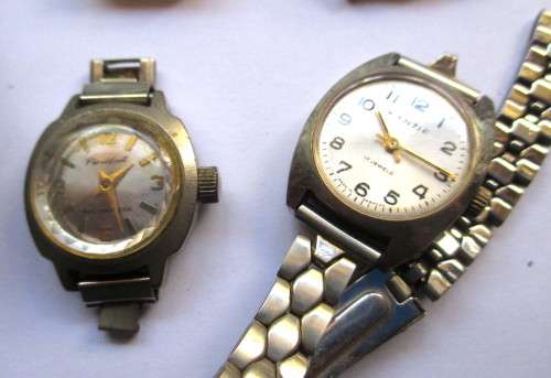 Lot of Five Watches. Not working. Good for Parts or just needs battery.