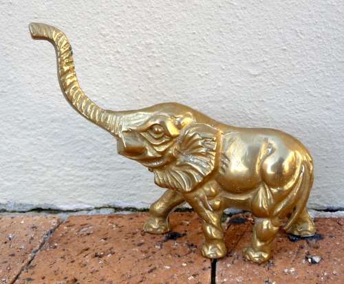 Vintage Cast Solid Brass Elephant figure, raised trunk. Decorative ornament, paperweight. 13x17cm