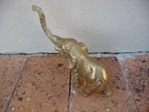 Vintage Cast Solid Brass Elephant figure, raised trunk. Decorative ornament, paperweight. 13x17cm
