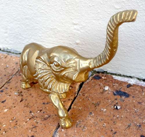 Vintage Cast Solid Brass Elephant figure, raised trunk. Decorative ornament, paperweight. 13x17cm