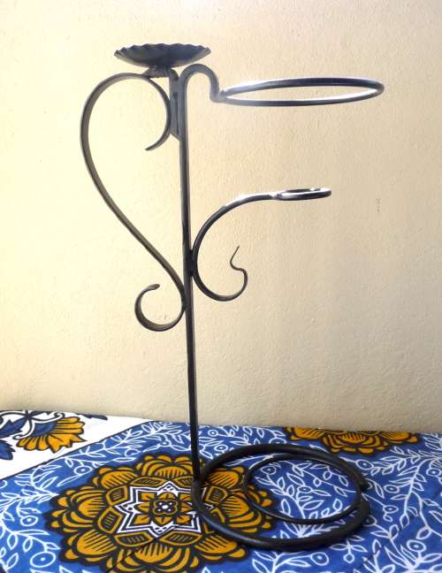 Large Iron Candle holder. Facinating design. 50cm high