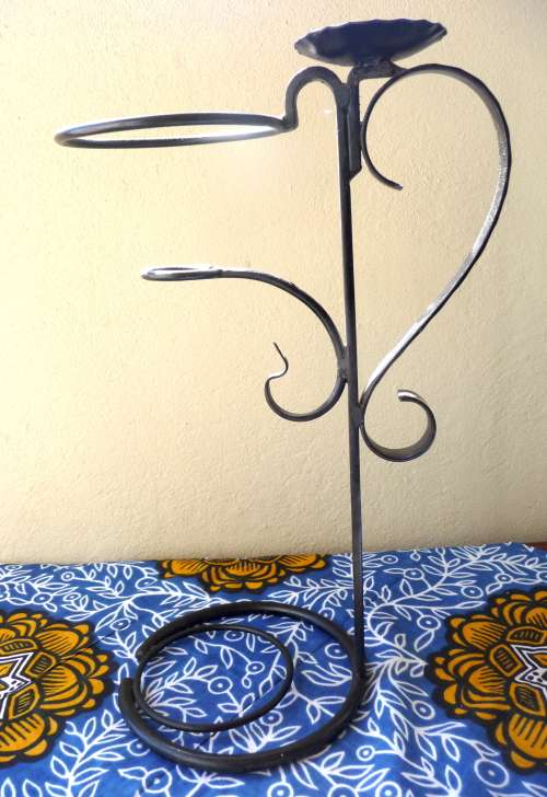 Large Iron Candle holder. Facinating design. 50cm high