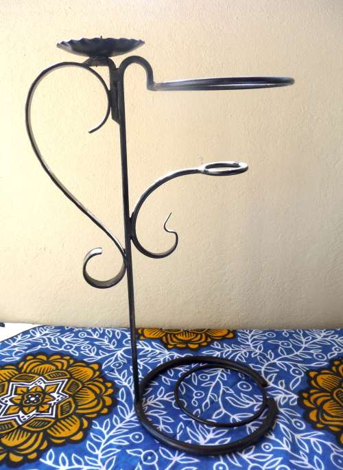 Large Iron Candle holder. Facinating design. 50cm high