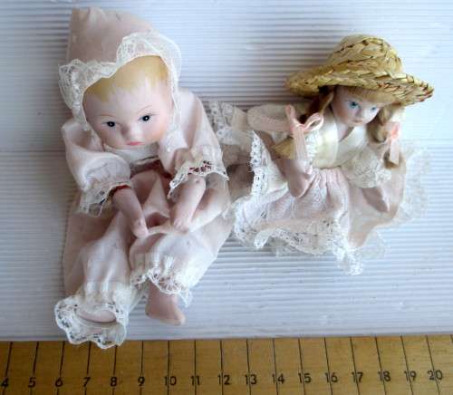 Two Antique Small Porcelain Dolls Arms and Legs Attached by an Elastic Band. Size as per photo.