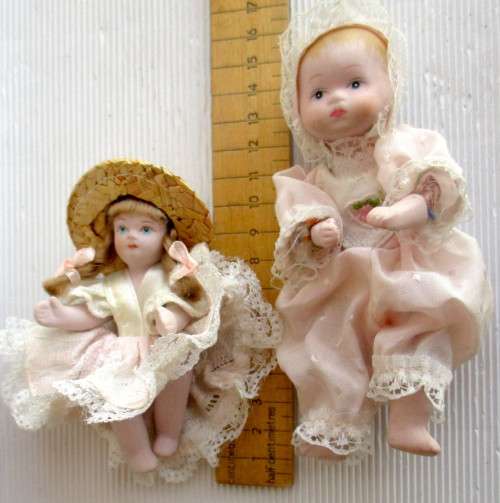 Two Antique Small Porcelain Dolls Arms and Legs Attached by an Elastic Band. Size as per photo.