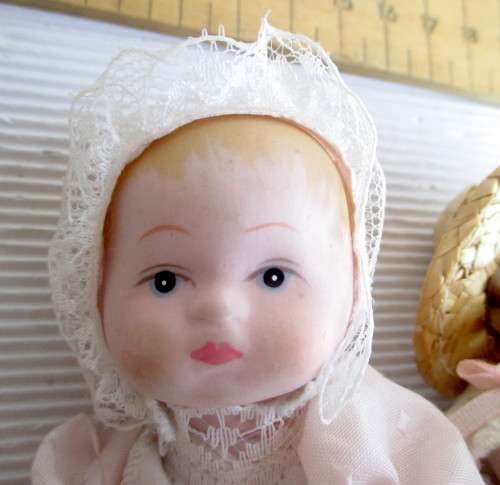 Two Antique Small Porcelain Dolls Arms and Legs Attached by an Elastic Band. Size as per photo.