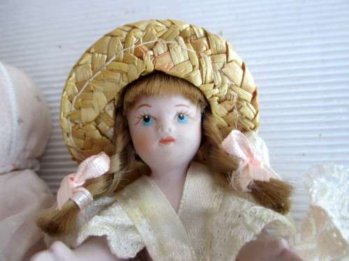 Two Antique Small Porcelain Dolls Arms and Legs Attached by an Elastic Band. Size as per photo.