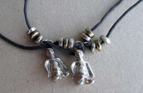 Costume Leather Necklace with Penquin Pendants.