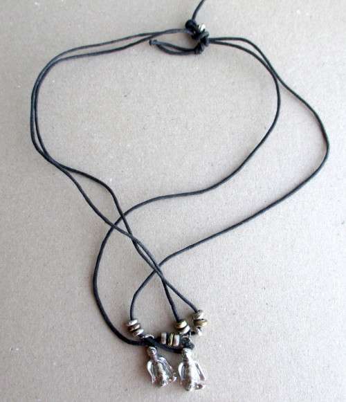 Costume Leather Necklace with Penquin Pendants.