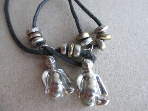 Costume Leather Necklace with Penquin Pendants.
