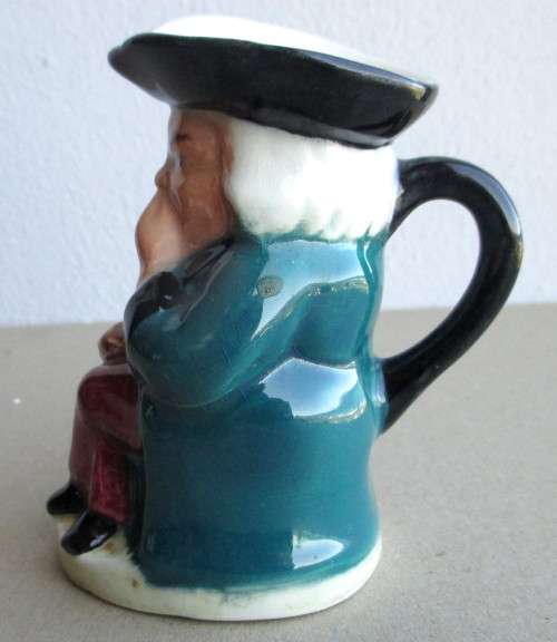 Vintage Porcelain Colonial Sailor Character mug small. 90mm high.