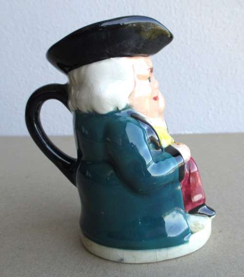 Vintage Porcelain Colonial Sailor Character mug small. 90mm high.
