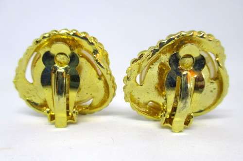 Lovely pair of Vintage Clip on Earrings. Large Faux Marbe set in gold color ribbon.