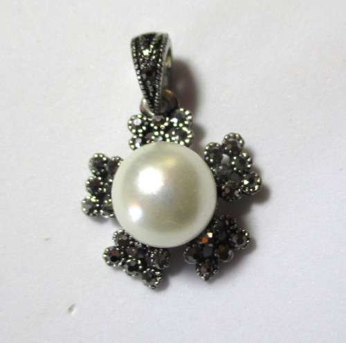 Vintage Marcasite and faux pearl Pendant. Lovely item.