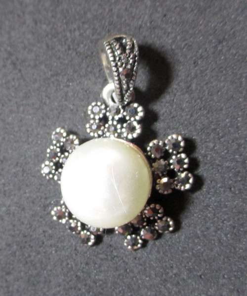 Vintage Marcasite and faux pearl Pendant. Lovely item.