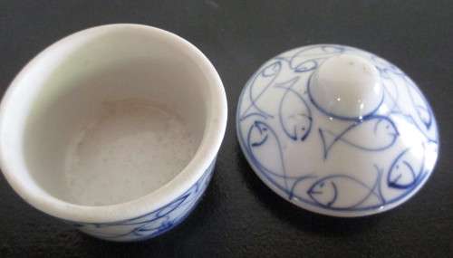 Small Blue and White handpainted ring/pin dish with lid.  No Marked with makers mark. 65mm high.