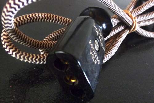 Vintage Electrical cord with light connection.