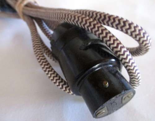 Vintage Electrical cord with light connection.