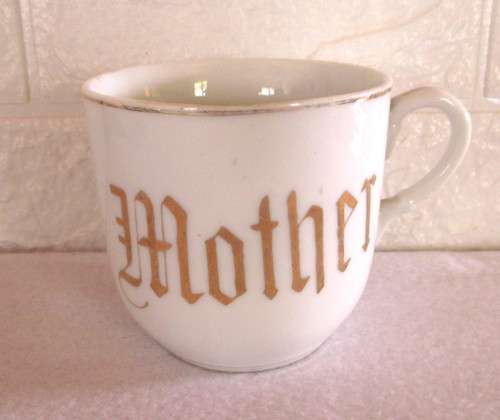 Large White Porcelain Mother Mug. 900mm high. No markings.