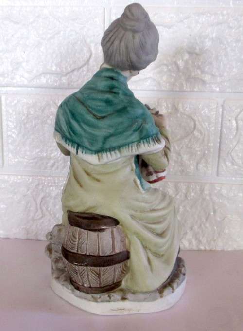 Lovely Vintage Unglazed Porcelain Figurine. Old Lady mending clothes. Taiwan. Spotless, 210mm high.