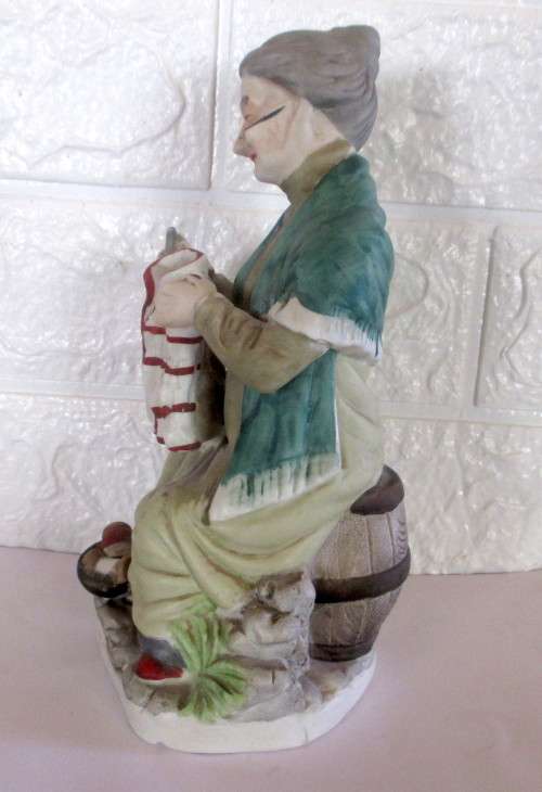 Lovely Vintage Unglazed Porcelain Figurine. Old Lady mending clothes. Taiwan. Spotless, 210mm high.