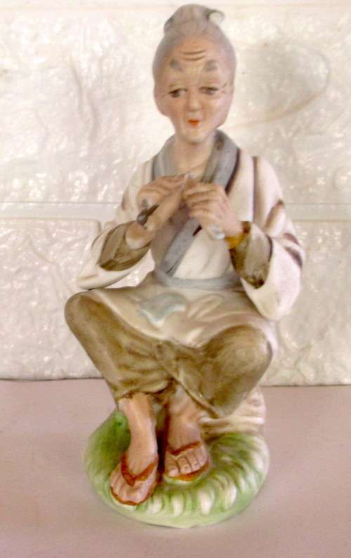 Lovely Vintage Unglazed Porcelain Figurine. 140mmhigh.