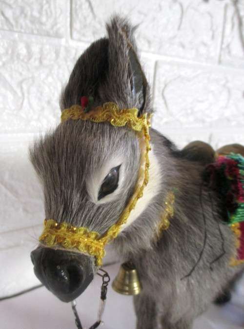 Adorable little Mexican? Donkey figurene. Real hair, carrying wood, blankets.  Very lifelike. 20cm h