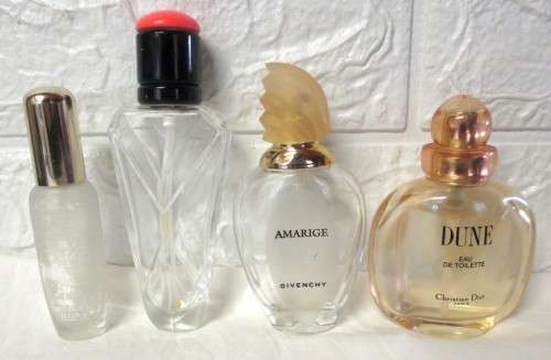Collection of 4 Empty Glass Perfume Bottles. As per photo.