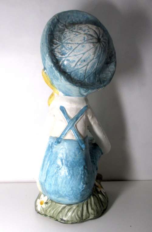 Cute Porcelain Garden helper figurine. 220mm high. No chips or cracks.