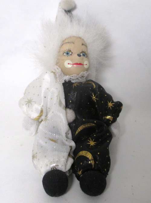 Vintage small Clown Doll with Porcelain face. 180mm long.