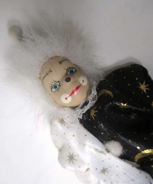 Vintage small Clown Doll with Porcelain face. 180mm long.