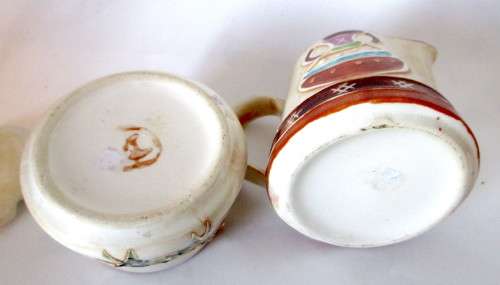 Handmade Ceranic Africa themed milk jug and sugar pot.
