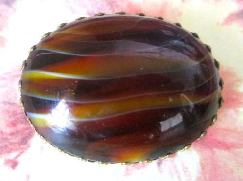 Large Vintage elegant Tiger Eye Brooch. Set in a delicate gold color frame. 44 x33mm.