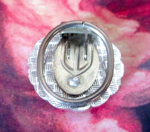 Vintage Stylish Scarf Clip. Mother of Pearl in a Marcasite and ornate silver color setting. 30mm dia