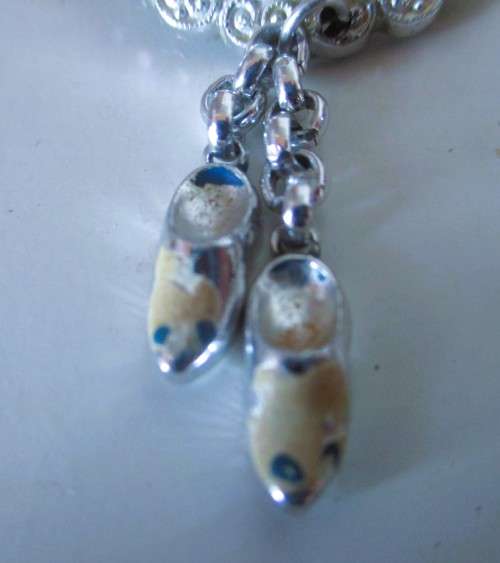 Vintage Painted Resin, Holland Windmill and silver metal clogs Brooch. As per Photo. 65mm