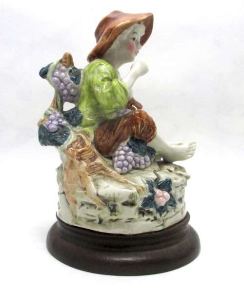 Vintage CapoDiMonte Boy Eating Grapes Figurine. On wooden stand. Spotless. 170 x110mm