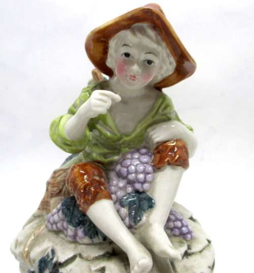 Vintage CapoDiMonte Boy Eating Grapes Figurine. On wooden stand. Spotless. 170 x110mm