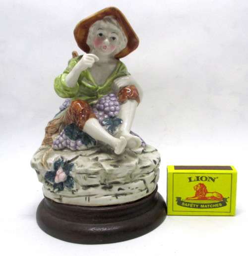 Vintage CapoDiMonte Boy Eating Grapes Figurine. On wooden stand. Spotless. 170 x110mm