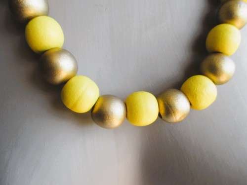 2 x Yellow Wooden bead Necklaces. One with Gold color.  64cm