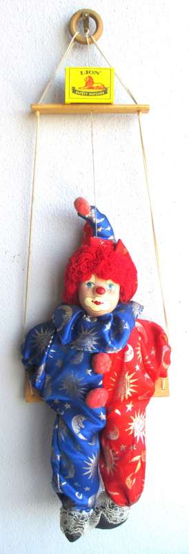 Vintage Hanging Porcelain Face Clown Doll with Red Hair, on a swing. Doll 400mm long