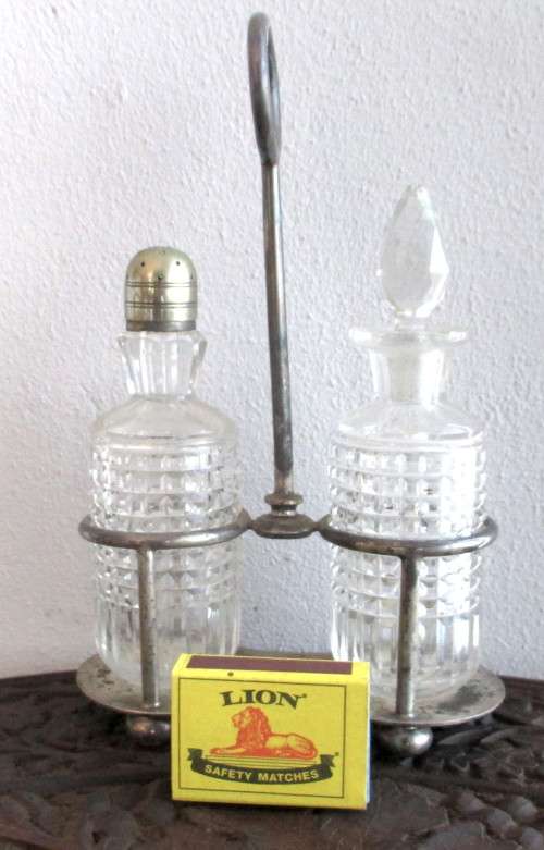 Vintage Silver Plate Elkington Two piece Cut Glass Cruet Set. Plate warn as per photo.