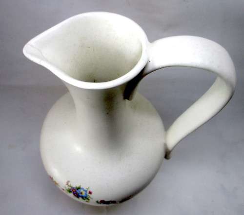 Vintage Large Unbranded Floral Pattern Bedroom Closet Water Jug. Note Repair at spout. 28cm high.