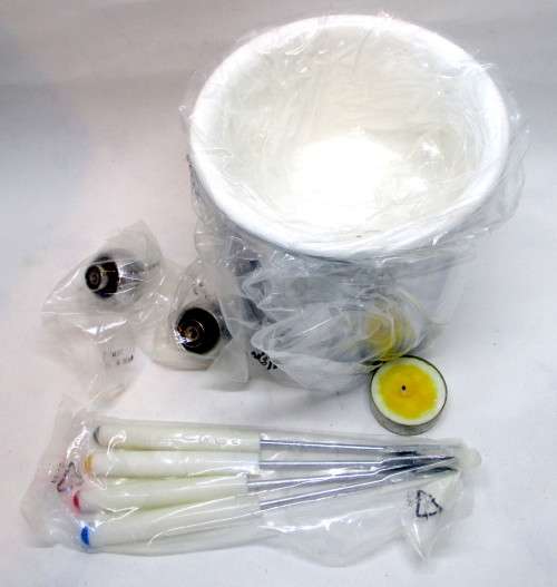 Swiss Chocolate Fondue Pot with 4 forks. Still inoriginal box, never been used.