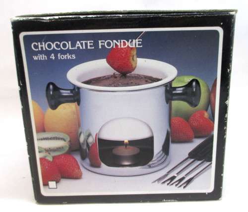 Swiss Chocolate Fondue Pot with 4 forks. Still inoriginal box, never been used.