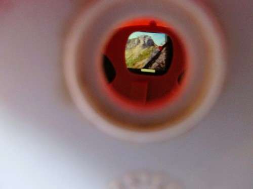 Two Vintage Miniature Swiss House Alpine Cottage Click Picture Viewer. Germany. One clicker broken.