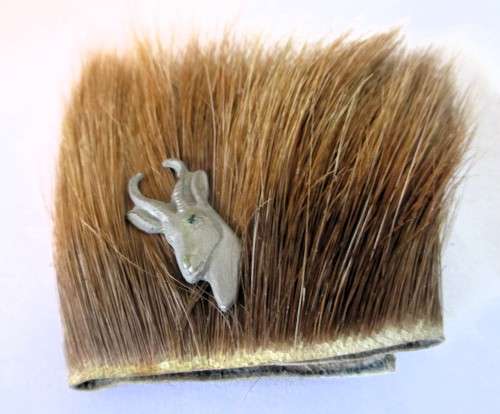 Metal Springbok head on Real Springbok hair cuff with stutts. 15cm. Marked with name. Unique.