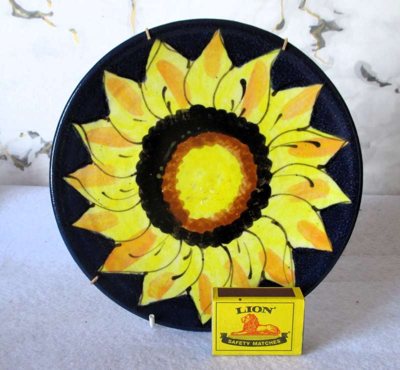 Hand painted glazed Sunflower wall hanging plate.  200mm diameter.