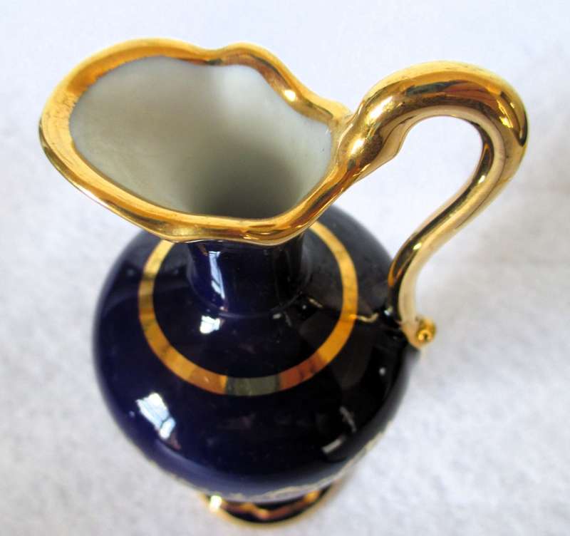 Vintage stunning Limoges jug is a rich cobalt blue hand embellished with gold. Marked. 150mm high.